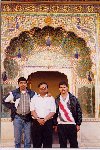 In front of one of the many decorated entrance acrches